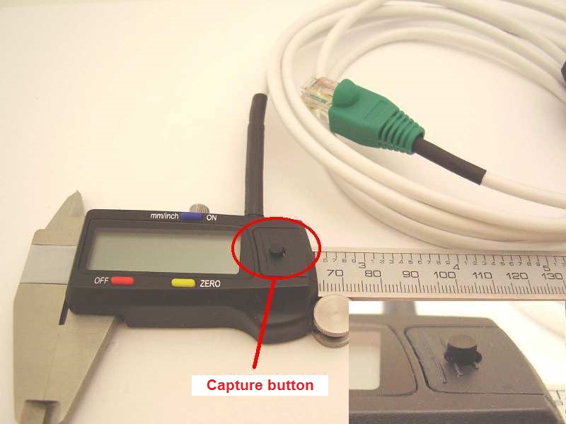 Caliper with capture button